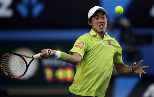 Kei Nishikori makes a forehand return to David Ferrer during their fourth round match at the Australian Open Monday. AP