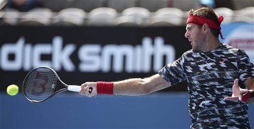 Juan Martin del Potro of Argentina plays a shot to Fabio Fognini of Italy during their match at the Sydney International tennis tournament in Sydney, Wednesday, Jan. 14, 2015. AP