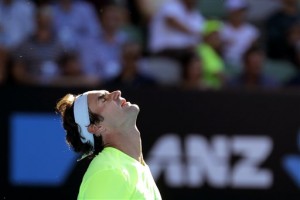 Roger Federer reacts after losing his third round match with Andreas Seppi Friday at the Australian Open. AP Photo