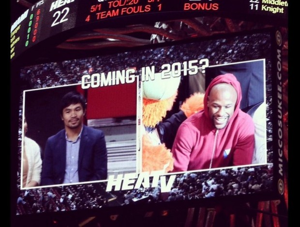 Manny Pacquiao (left) and Floyd Mayweather Jr. attend the Miami Heat-Milwaukee Bucks games. Screengrab from the Heat's Twitter account