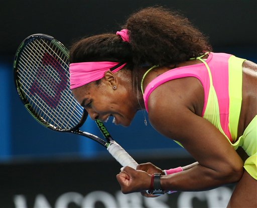 Serena Williams of the U.S. celebrates a point won against Alison Van Uytvanck of Belgium during their first round match at the Australian Open tennis championship in Melbourne, Australia, Tuesday, Jan. 20, 2015. AP