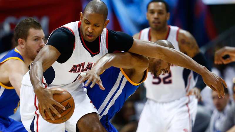 Atlanta Hawks center Al Horford (15) and Golden State Warriors guard Leandro Barbosa (19) fight for the ball in the second half of an NBA basketball game Friday, Feb. 6, 2015, in Atlanta. Atlanta won 124-116. (AP Photo/John Bazemore)