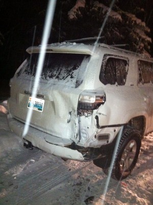 This Dec. 28, 2014 photo provided by the Aspen Police Department shows one of the two vehicles involved in a hit-and-run in Aspen, Colo. Disgraced cyclist Lance Armstrong hit two parked cars after a night of partying but agreed to let his longtime girlfriend take the blame to avoid national attention, police reports show. Aspen police cited Armstrong with failing to report an accident and speeding on Jan. 12, 2015, after the Dec. 28 accident, but only after his girlfriend, Anna Hansen, admitted to lying for him. (AP Photo/Aspen Police Department)