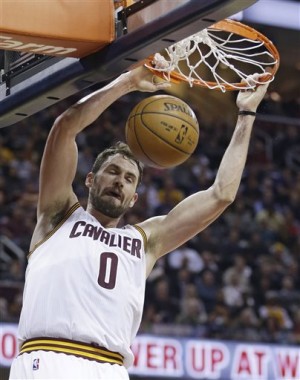 Cleveland Cavaliers' Kevin Love dunks the ball against the Los Angeles Clippers during the second quarter of an NBA basketball game Thursday, Feb. 5, 2015, in Cleveland. AP