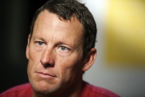 In this Feb. 15, 2011, file photo, Lance Armstrong pauses during an interview in Austin, Texas. Lance Armstrong has pleaded guilty to careless driving for hitting two parked cars with his SUV in Aspen.  The cyclist entered his plea by mail on Friday under a plea agreement with prosecutors, closing the case and avoiding a court appearance. Armstrong's girlfriend, Anna Hansen, originally told police she was behind the wheel in the Dec. 28 accident in icy conditions but later confessed that she lied to avoid media attention.  AP