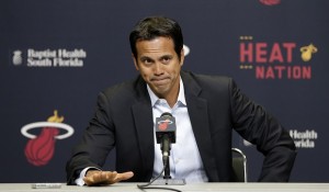 Miami Heat head coach Erik Spoelstra pauses as he talks to reporters on the condition of Heat's forward Chris Bosh in Miami, Saturday, Feb. 21, 2015. The All-Star forward Bosh will miss at least the remainder of the NBA basketball season because of blood clots on one of his lungs. (AP Photo/Alan Diaz)