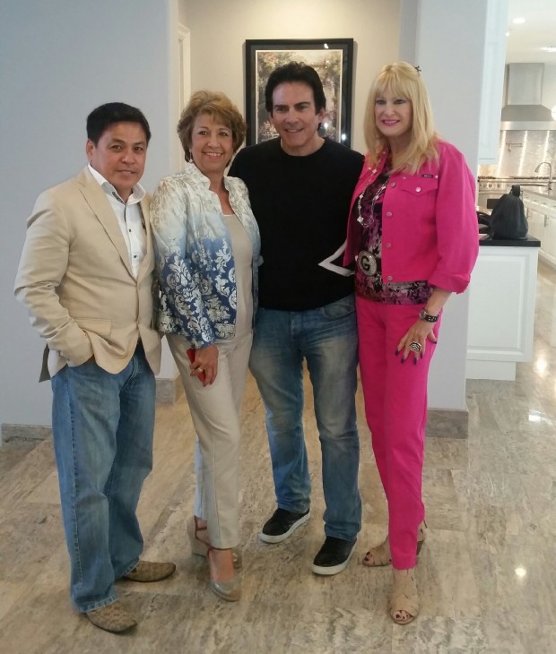 From left: Real estate agents Nick Enciso and Elsa Nelson and sellers Gail and Roger Dauer.