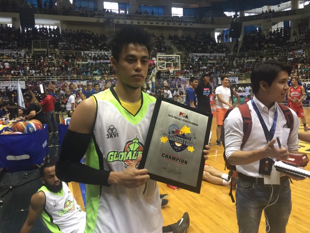 Terrence Romeo holds up his Three-Point shootout trophy. Mark Giongco/INQUIRER.net
