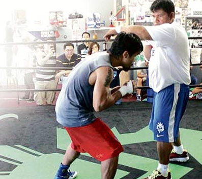 Manny Pacquiao and Buboy Fernandez. INQUIRER File Photo