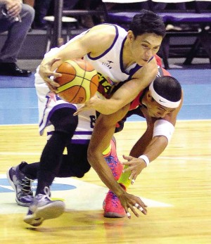 ARWIND Santos of San Miguel Beer tries to steal the ball from PJ Simon of Purefoods in last night’s match.  AUGUST DELA CRUZ