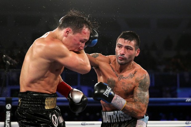 Lucas Matthysse (R) lands a right cross against Ruslan Provodnikov at the Turning Stone Resort Casino on April 18, 2015 in Verona, New York. Matthysee won the 12 round bout by scores of 114-114, 115-113 and 115-113.   Alex Menendez/Getty Images/AFP