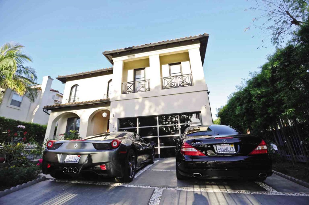 MANNY’S HOLLYWOOD MANOR (BY HOI POLLOI STANDARDS)  A world away from his impoverished beginnings, Manny Pacquiao’s Los Angeles home on Plymouth Blvd—where a Mercedes and a Ferrari cool their engines in the California spring—is abuzz nowadays with fight talk, prayed-over feasts and playtime with the “Pacman” family. But the Pacmans are moving up to a real mansion in Beverly Hills before the month ends. REM ZAMORA