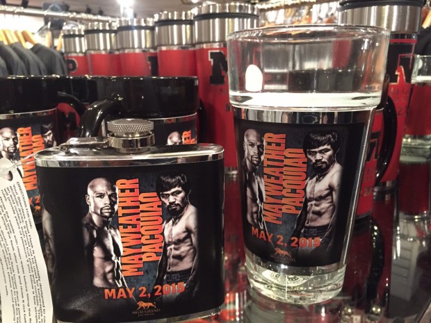 A Floyd Mayweather and Manny Pacquiao-designed flask sells for $25 at the official merchandise shop.