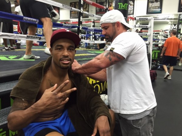 Super middleweight J'Leon Love gets a massage after training. He's been with Mayweather promotions for three years.