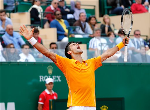  Novak Djokovic of Serbia celebrates after defeating Rafael Nadal of Spain, during their semifinal match of the Monte Carlo Tennis Masters tournament, in Monaco, Saturday, April, 18, 2015. AP 