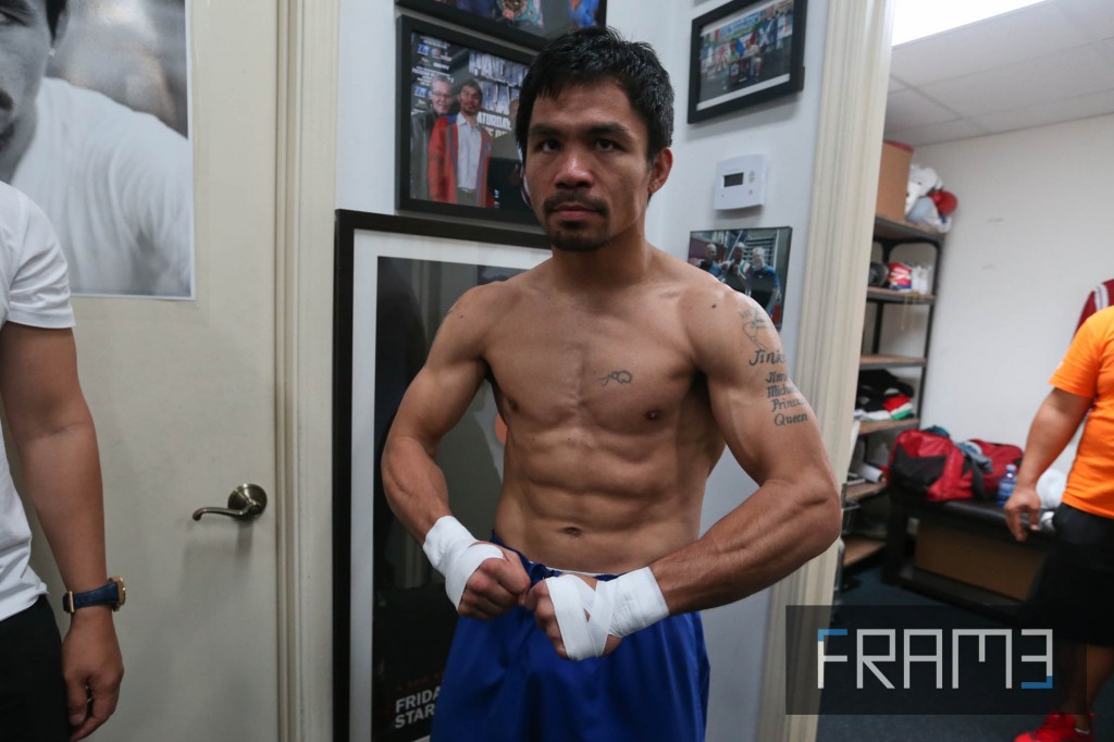 Manny Pacquiao shows his body to select journalists after training at the Wild Card gym in Hollywood, CA on Thursday afternoon, 23 April 2015. REM ZAMORA/INQUIRER PHOTO