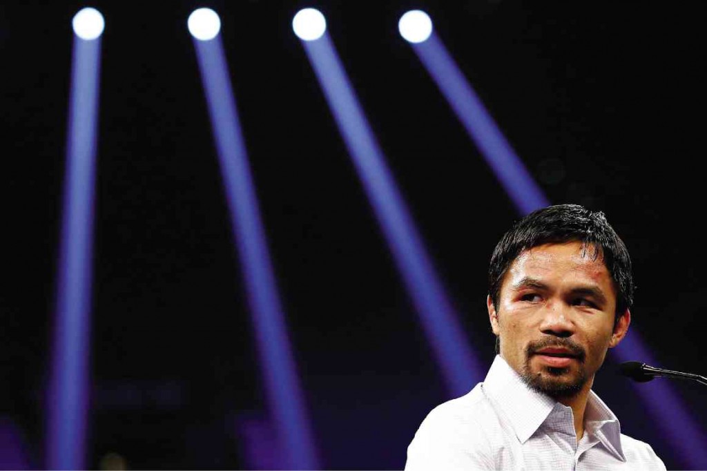 UNDAUNTED  Manny Pacquiao answers questions during a news conference after losing to Floyd Mayweather Jr. in their welterweight unification bout in Las Vegas, Nevada, on Saturday night (Sunday in Manila).  AFP 