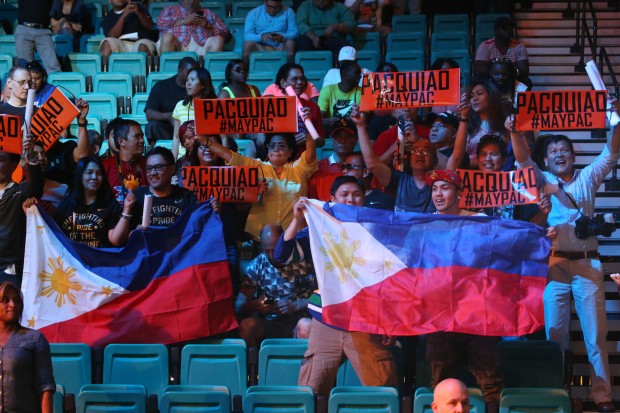 Filipino fans cheer during the official weigh in of Manny Pacquiao and Floyd Mayweather Jr. at the MGM Grand Arena in Las Vegas, Nevada. PHOTO BY REM ZAMORA