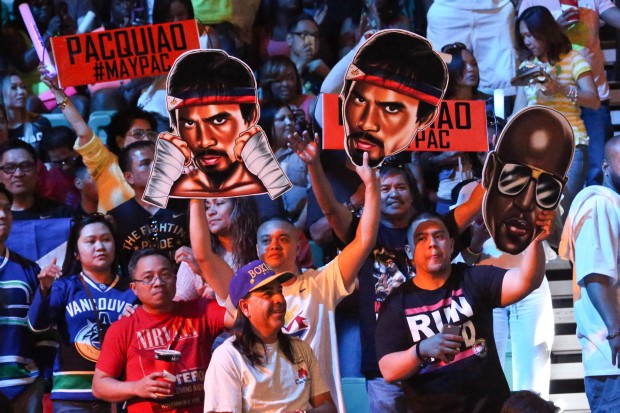 Fans cheer during the official weigh in of Manny Pacquiao and Floyd Mayweather Jr. at the MGM Grand Arena in Las Vegas, Nevada. PHOTO BY REM ZAMORA