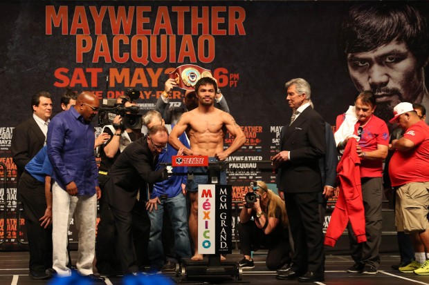 Manny Pacquiao tips the scales in the official weigh-in at MGM Grand Garden Arena in Las Vegas. Photo by Rem Zamora/INQUIRER/ See more at FRAME