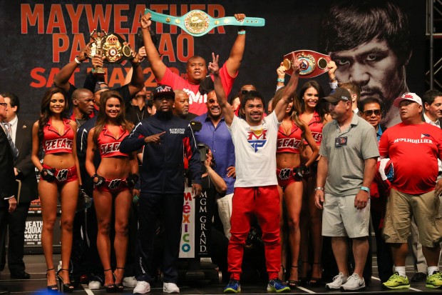 Manny Pacquiao and Floyd Mayweather Jr. after their official weigh in at the MGM Grand in Las Vegas, Nevada on Friday, 1 May 2015. PHOTO BY REM ZAMORA