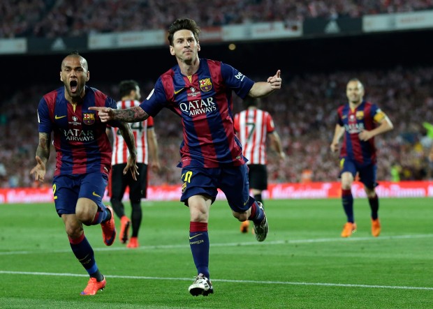 Barcelona's Lionel Messi celebrates after scoring the opening goal during the final of the Copa del Rey soccer match between FC Barcelona and Athletic Bilbao at the Camp Nou stadium in Barcelona, Spain, Saturday, May 30, 2015. (AP Photo/Manu Fernandez)