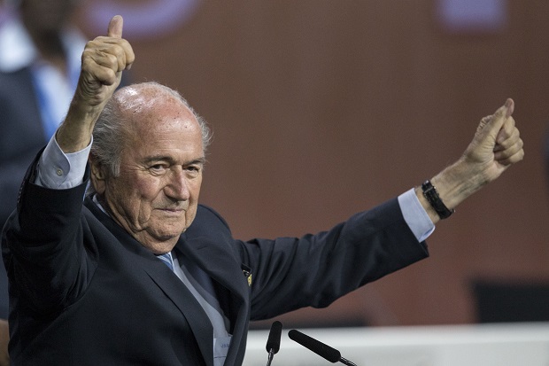 FIFA president Sepp Blatter after his election as President at the Hallenstadion in Zurich, Switzerland, Friday, May 29, 2015. Blatter has been re-elected as FIFA president for a fifth term, chosen to lead world soccer despite separate U.S. and Swiss criminal investigations into corruption. The 209 FIFA member federations gave the 79-year-old Blatter another four-year term on Friday after Prince Ali bin al-Hussein of Jordan conceded defeat after losing 133-73 in the first round.  (Patrick B. Kraemer/Keystone via AP)