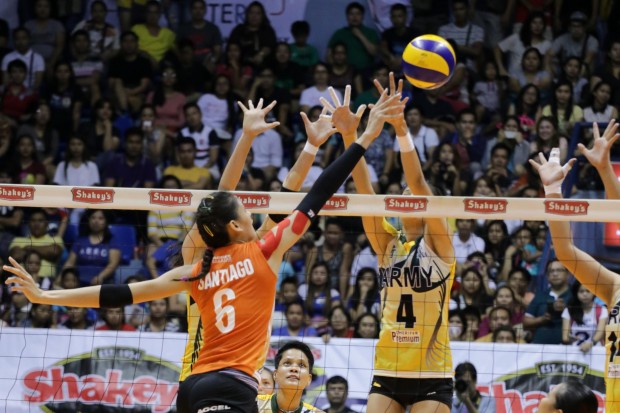 Jaja Santiago soars above the net. Photo by Tristan Tamayo/INQUIRER.net