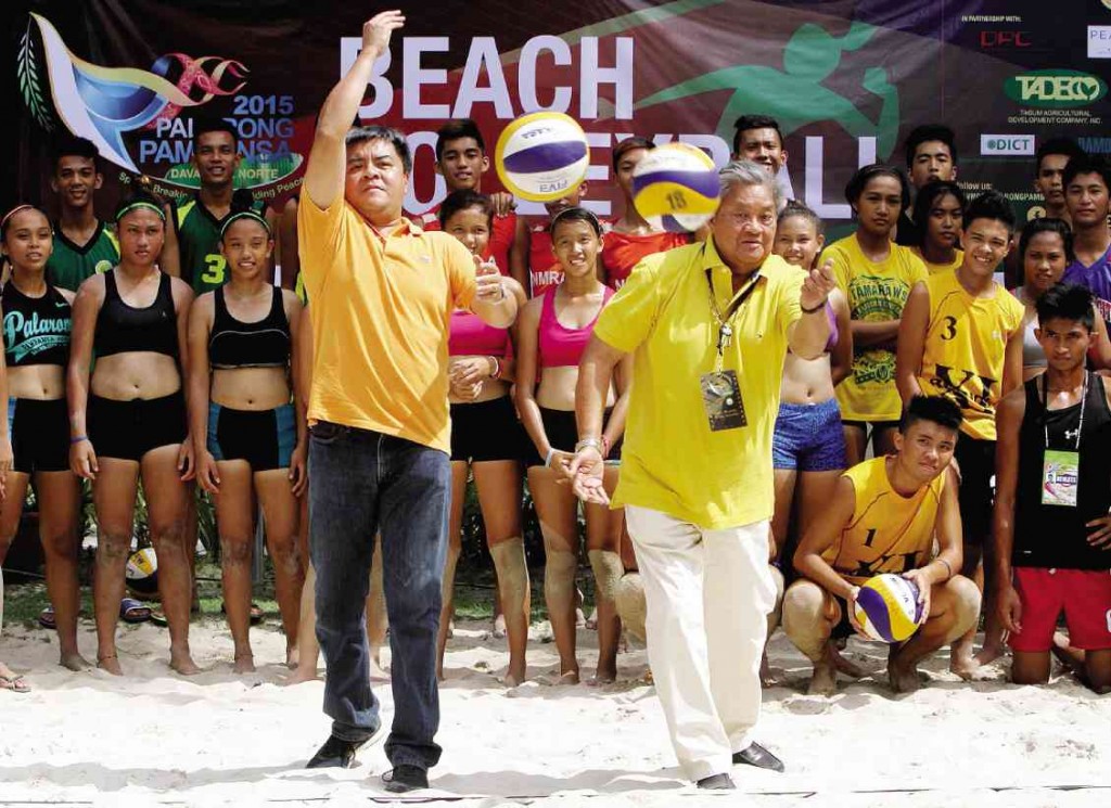 PALARO IN FULL SWING Davao Del Norte Gov. Rodolfo Del Rosario (right) and son Rodolfo “Rodney” del Rosario Jr. make the ceremonial serves opening hostilities in the beach volleyball competition of the Palarong Pambansa 2015 at Paradise Island Park and Beach Resort City of Samal, Davao del Norte. Action in the event completes the 27-sport schedule of the games among the country’s finest student-athletes. (See story on A30) RICHARD A. REYES