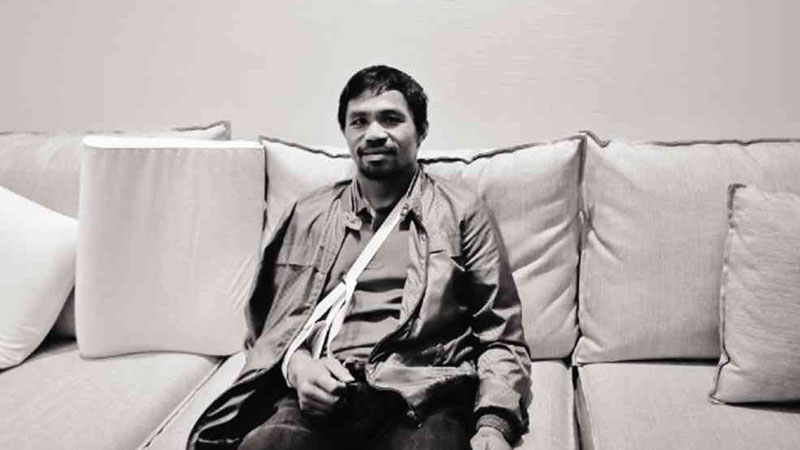 CALM BEFORE THE STORM  He may have lost to Floyd Mayweather Jr. and could face sanctions from boxing officials for failing to disclose an injury before the fight, but Manny Pacquiao appears unfazed in his hotel room despite an injured shoulder that had his arm in a sling. This photo, posted on the Top Rank Manny Pacquiao Fan Page, earned almost 200K likes, with “get well soon” comments in English, Filipino, Spanish and even in Cebuano.  PHOTO GRAB FROM TOP RANK BOXING TWITTER ACCOUNT