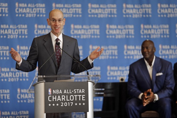 NBA Commissioner Adam Silver, left, speaks as Charlotte Hornets owner Michael Jordan, right, listens during a news conference, Tuesday, June 23, 2015, to announce Charlotte, N.C., as the site of the 2017 NBA All-Star basketball game. (AP Photo/Chuck Burton)