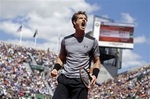 Britain's Andy Murray clenches his fist after scoring a point in the fourth round match of the French Open tennis tournament against France's Jeremy Chardy at the Roland Garros stadium, in Paris, France, Monday, June 1, 2015. AP PHOTO