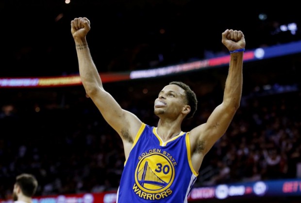 CLEVELAND, OH - JUNE 16: Stephen Curry #30 of the Golden State Warriors celebrates after they defeated the Cleveland Cavaliers 105 to 97 in Game Six of the 2015 NBA Finals at Quicken Loans Arena on June 16, 2015 in Cleveland, Ohio. NOTE TO USER: User expressly acknowledges and agrees that, by downloading and or using this photograph, user is consenting to the terms and conditions of Getty Images License Agreement.   Ezra Shaw/Getty Images/AFP