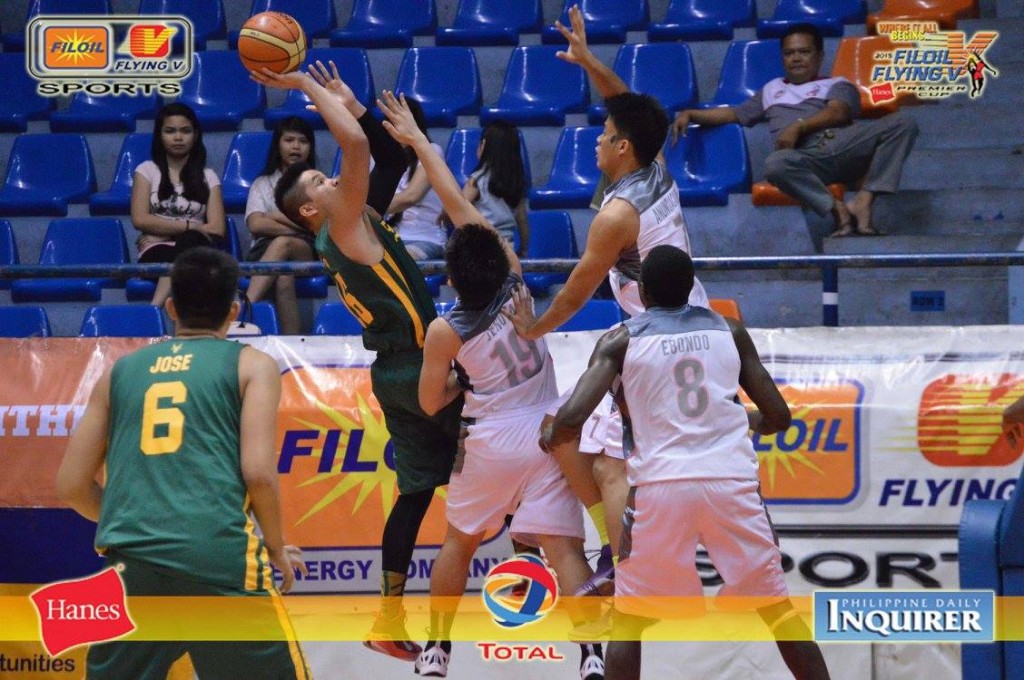 FEU's Roger Pogoy attempts a shot over his CEU defenders. PHOTO FROM FILOIL FLYING V TOURNAMENT'S FACEBOOK PHOTO