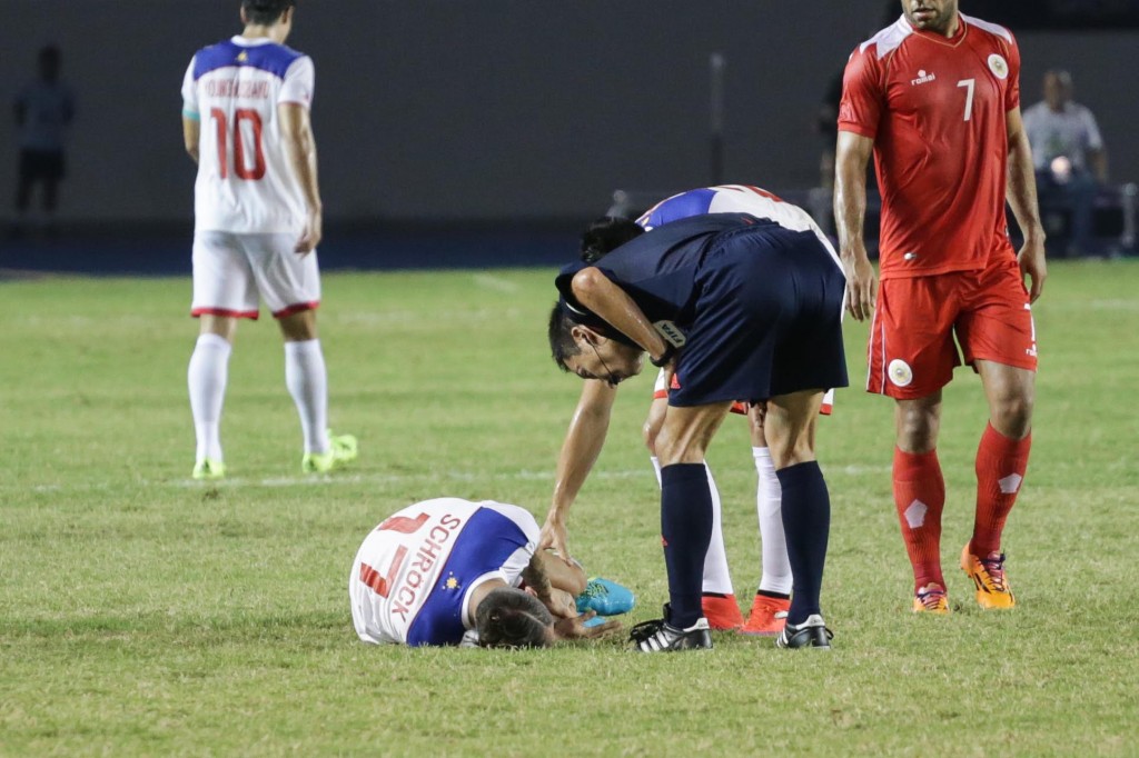 Stephan Schrock down on the pitch. Photo by Tristan Tamayo/INQUIRER.net 
