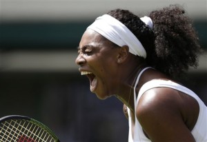 Serena Williams of the United States celebrates a point during the women's singles first round match against Margarita Gasparyan of Russia at the All England Lawn Tennis Championships in Wimbledon, London, Monday June 29, 2015.  AP PHOTO/PAVEL GOLOVKIN