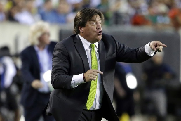 Mexico head coach Miguel Herrera yells during the first half of the CONCACAF Gold Cup championship soccer match against Jamaica, Sunday, July 26, 2015, in Philadelphia. (AP Photo/Matt Rourke)