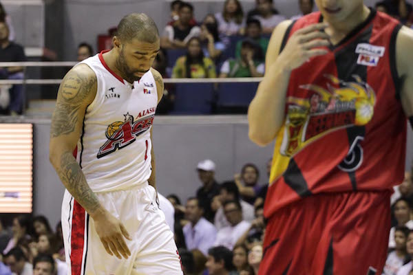 Alaska import Romeo Travis walks with his head down in the second half of the Aces' Game 4 loss to the San Miguel Beermen. Photo by Tristan Tamayo/INQUIRER.NET