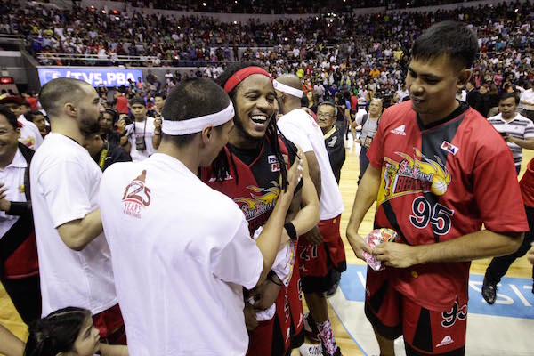 Arizona Reid smiles and celebrates with San Miguel teammates after winning PBA Governors' Cup crown. Photo by Tristan Tamayo/INQUIRER.NET
