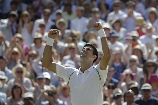 Novak Djokovic of Serbia celebrates winning the singles match against Richard Gasquet of France after their men's singles semifinal match at the All England Lawn Tennis Championships in Wimbledon, London, Friday July 10, 2015. Djokovic won 7-6, 6-4, 6-4. AP 