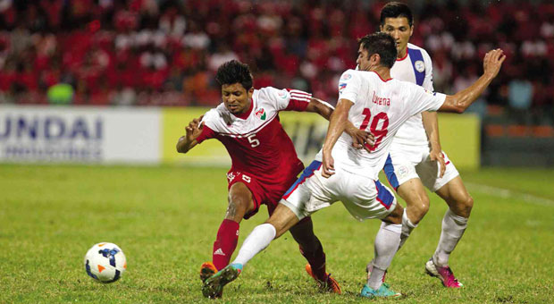 SWEAT AND TEARS The Philippine Azkals’ Jerry Lucena strips Maldives’ Fazeel Ibrahim of the ball during Tuesday’s match that the Philippines won 3-2 at extra time after 120 exhausting minutes of play at the National Stadium in Male, Maldives. The Azkals will play for the championship against Palestine Friday. WORLD SPORT GROUP/CONTRIBUTED PHOTO Read more: https://sports.inquirer.net/154263/azkals-all-heart-play-for-afc-title-on-friday#ixzz3ixPBzyhb  Follow us: @inquirerdotnet on Twitter | inquirerdotnet on Facebook