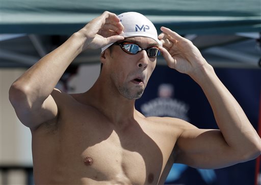 Michael Phelps prepares to compete in the preliminary round of the men's 200-meter breaststroke at the the U.S. swimming nationals, Monday, Aug. 10, 2015, in San Antonio. (AP Photo/Eric Gay)