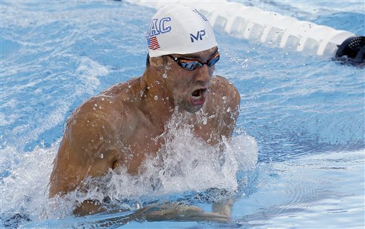 Michael Phelps competes in the finals of the men's 200-meter breaststroke at the the U.S. swimming nationals, Monday, Aug. 10, 2015, in San Antonio. Phelps finished fifth. (AP Photo/Eric Gay)