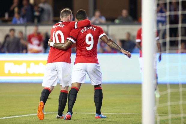 IMAGE DISTRIBUTED FOR INTERNATIONAL CHAMPIONS CUP - Wayne Rooney celebrates the first goal made by Memphis Depay against the San Jose Earthquakes at the Avaya Stadium in the first half of the International Champions Cup North America between the San Jose Earthquakes and visiting Manchester United, on Tuesday, July 21, 2015, in San Jose, California. Manchester United lead 2-1 at the end of the first half. (Tomas Ovalle/AP Images for International Champions Cup)