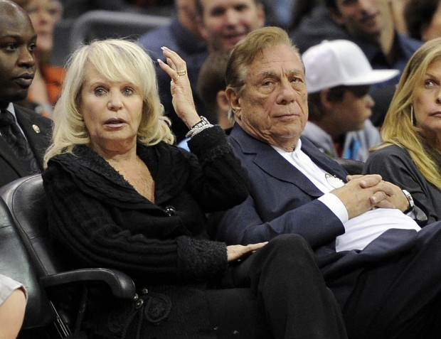 In this Nov. 12, 2010, file photo, Shelly Sterling, left, sits with her husband, Los Angeles Clippers owner Donald Sterling, during the Clippers' NBA basketball game against the Detroit Pistons in Los Angeles. The former team owner has filed for divorce from Shelly Sterling, his attorney Bobby Samini said Wednesday, Aug. 5, 2015. (AP Photo/Mark J. Terrill, File)