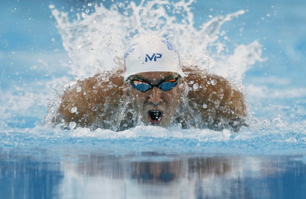 Michael Phelps competes in the men's 100-meter butterfly finals at the the U.S. swimming nationals, Saturday, Aug. 8, 2015, in San Antonio. Phelps won. (AP Photo/Eric Gay)