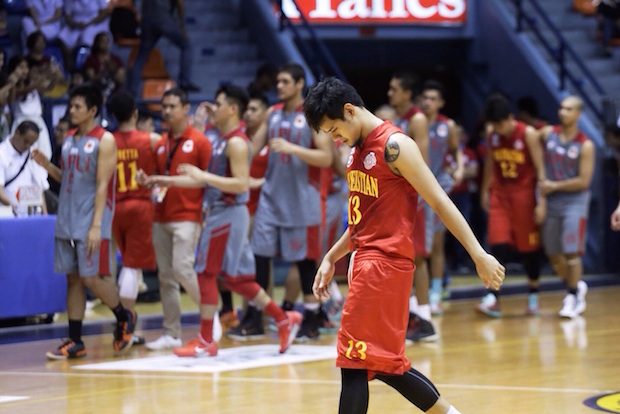 San Sebastian guard Jamil Ortuoste walks with his head down after his Stags lost to the Lyceum Pirates Friday at the Arena in San Juan. Ortuoste was a former player of Topex Robinson, who now coaches the Pirates. Tristan Tamayo/INQUIRER.net