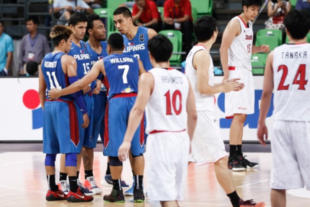 Marc Pingris, Calvin Abueba and the rest of Gilas five on the floor. Photo from Fiba.com