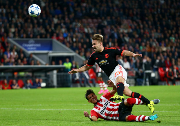 United loses 2-1 to PSV Eindhoven, Shaw to broken leg | Inquirer Sports