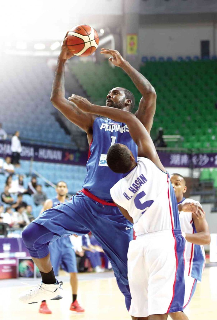 ANDRAY Blatche (blue) of the Philippines, hopes to perform better than he did against Hamad Hasan and Kuwait. AP